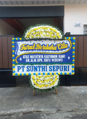 Papan Bunga Duka di Olo