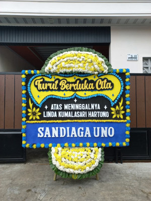 Papan Bunga Duka di Olo