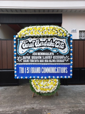 Papan Bunga Duka di Olo